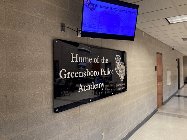 Home of the Greensboro Police Academy Acrylic Signs Made by The Carolina Signsmith in Greensboro, NC 